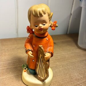 Hummel Orange-Coated Girl Figurine Playing Harp